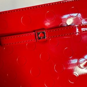 NWT Kate Spade Amy Camellia Street handbag with wrist strap.